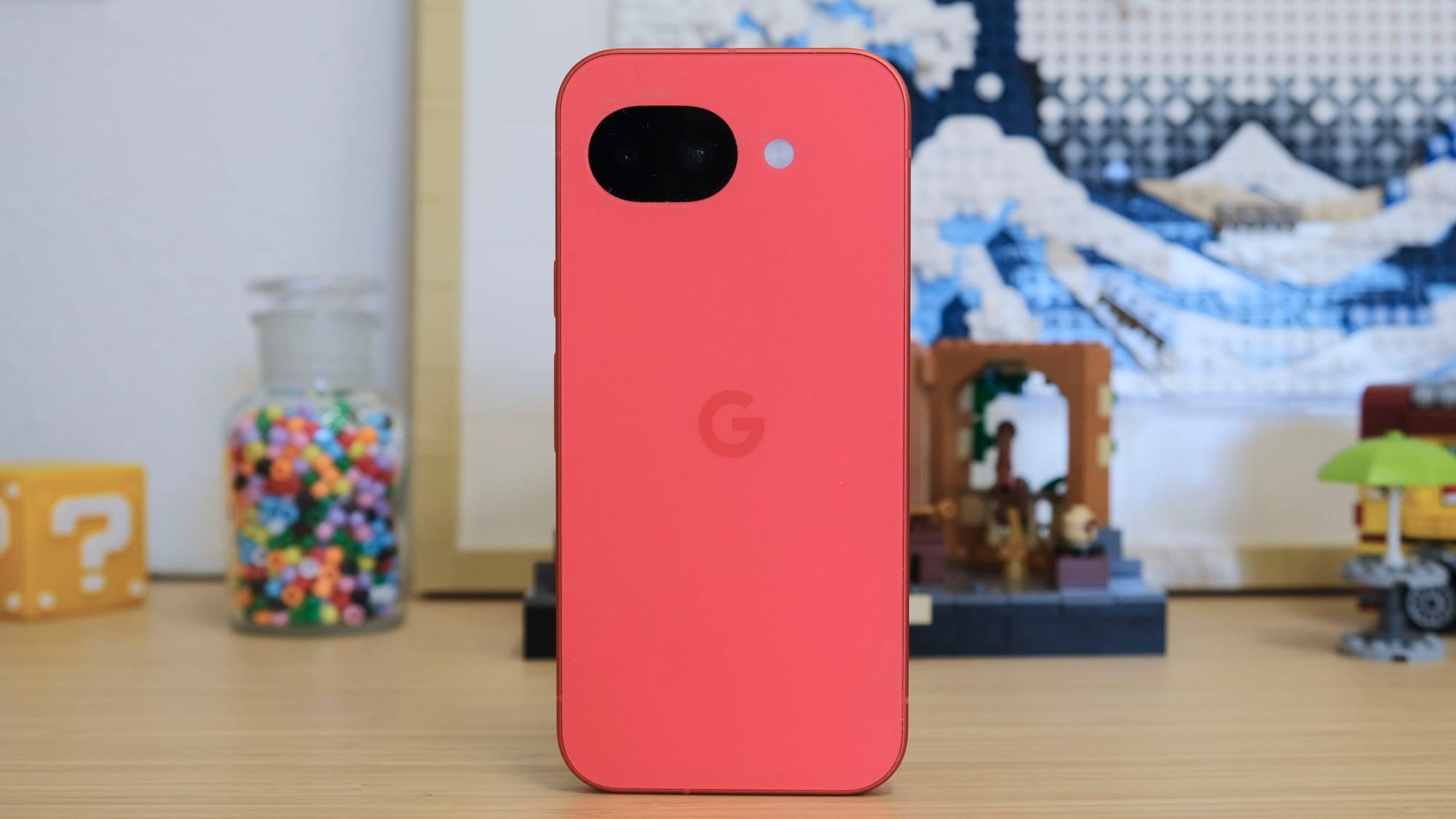 The back of the Berry Pixel 10a standing on a desk.