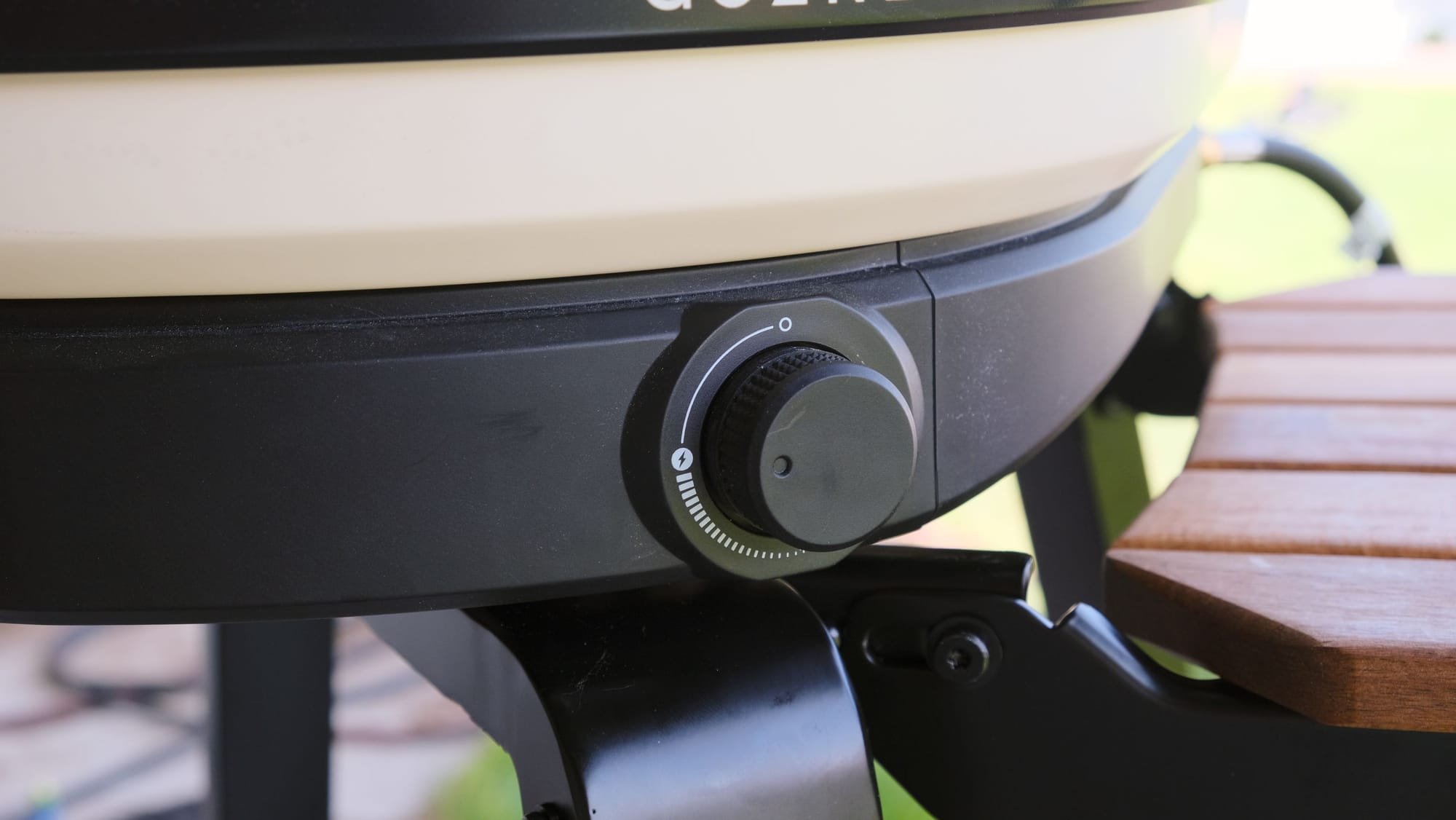 Close-up of the gas burner control dial and ignition knob on the Gozney Arc XL pizza oven.